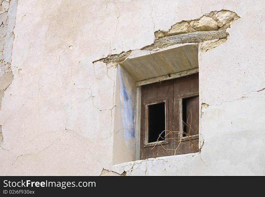 Old wooden window of an abandoned house