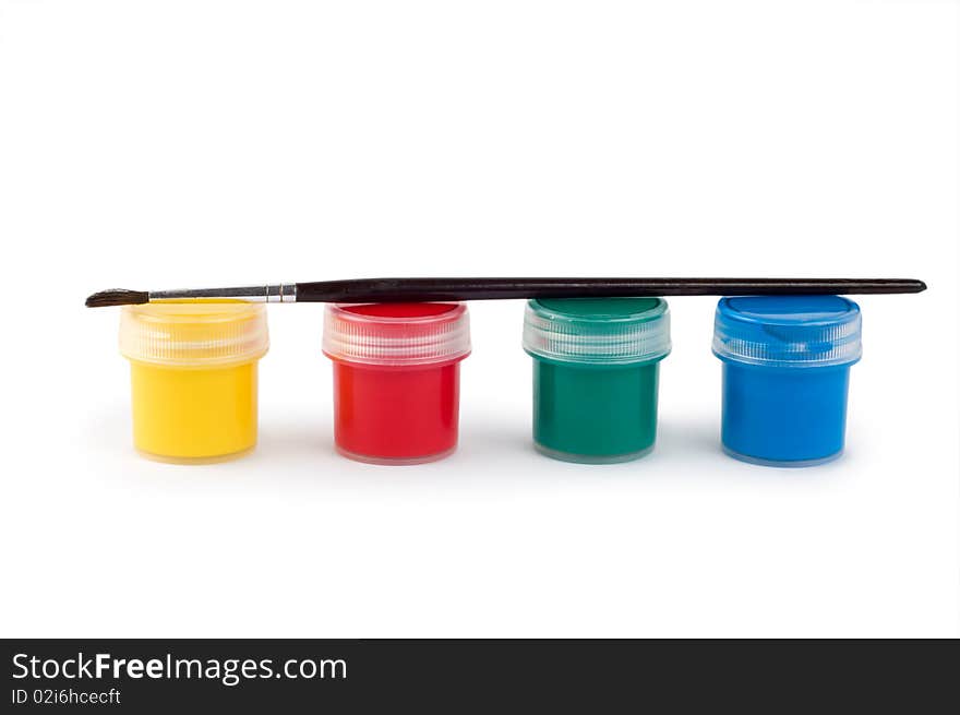 Gouache paint cans and brush isolated on white background