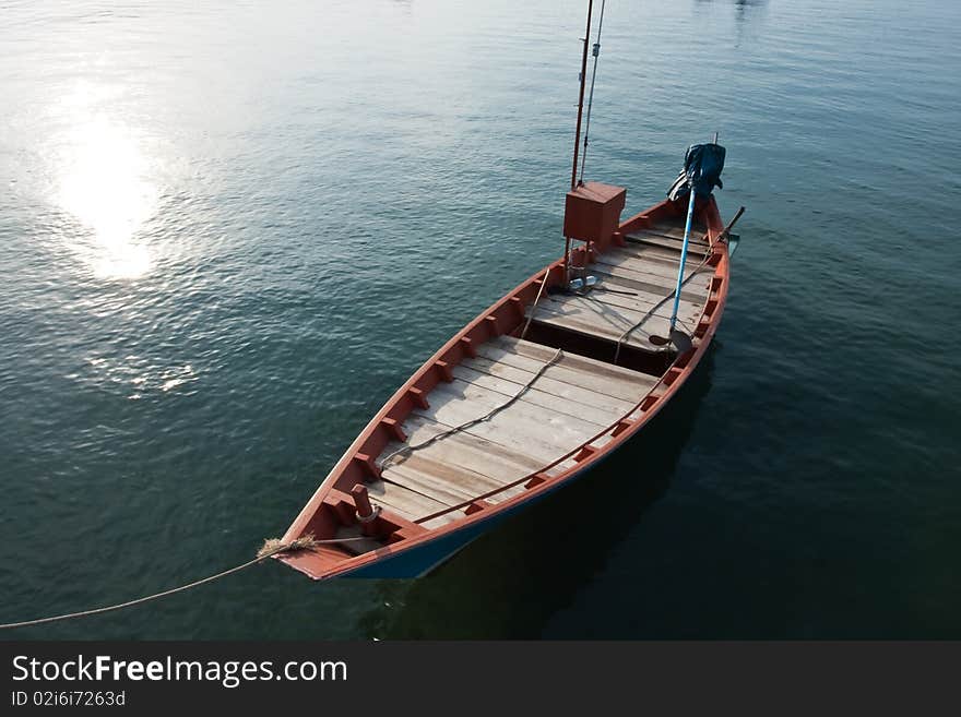 Boat of Fisherman on sea background