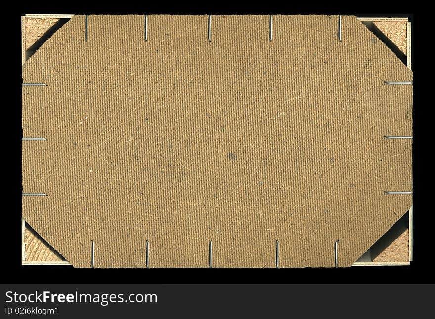 Closeup image of back wooden crate (framed) on black background