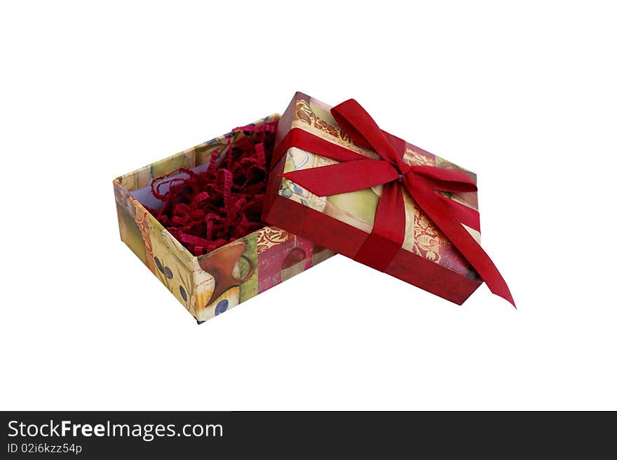 Open gift box with filler and red ribbon