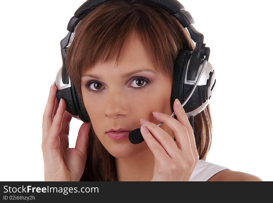 Close up Portrait of a beautiful woman posing in headphones and white dress isolated on a white background