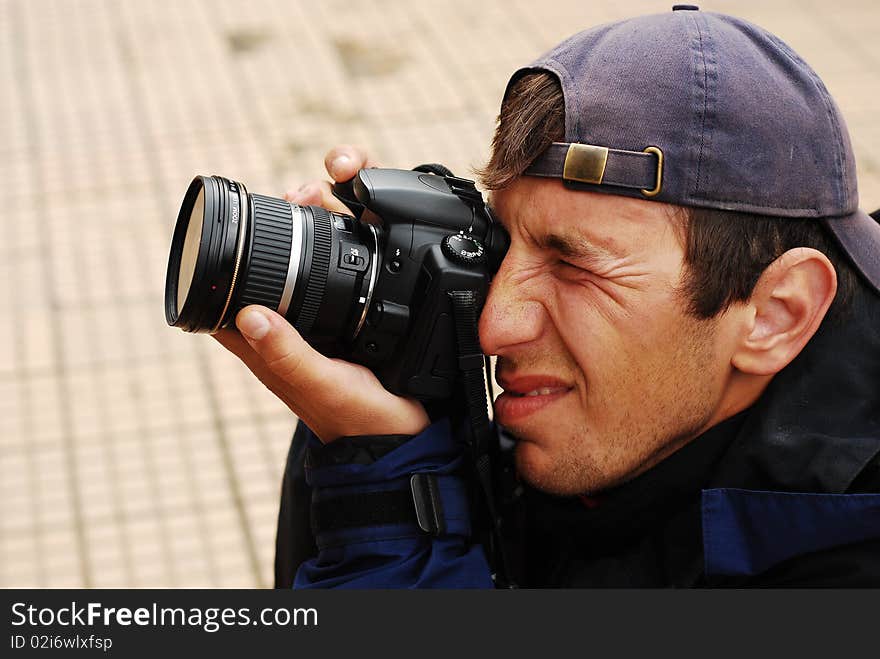 Photographer portrait while focusing the subject