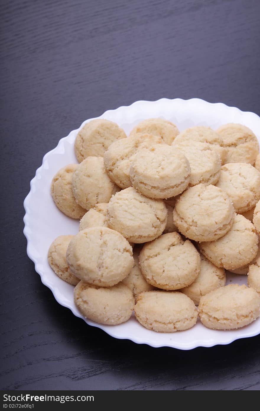 Sweet cookies on white plate