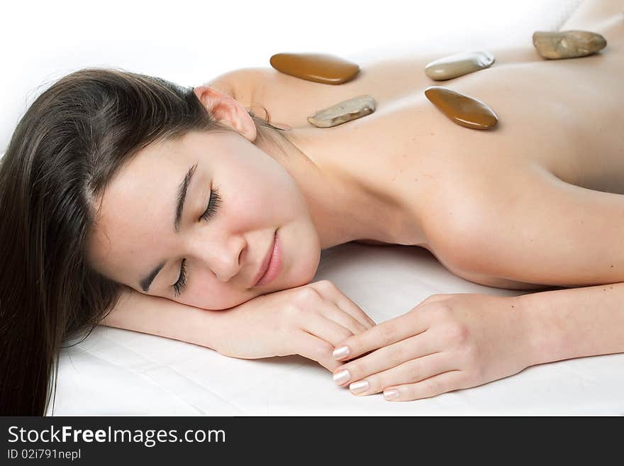 Young beautiful woman in a spa