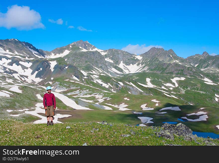 Hiker boy in Caucasus mountains