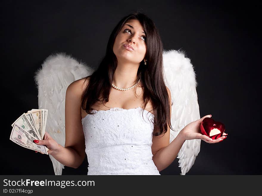 Angel with white wings on a black background