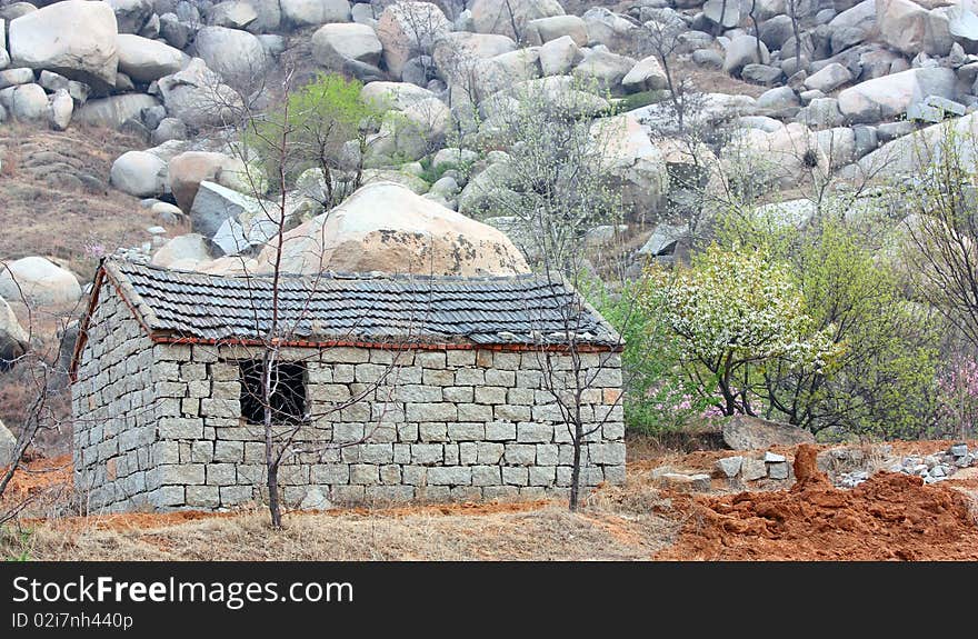 The stone house located in the foothills.