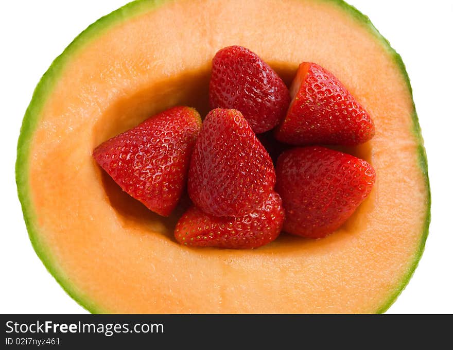 Cantaloupe melon with strawberries