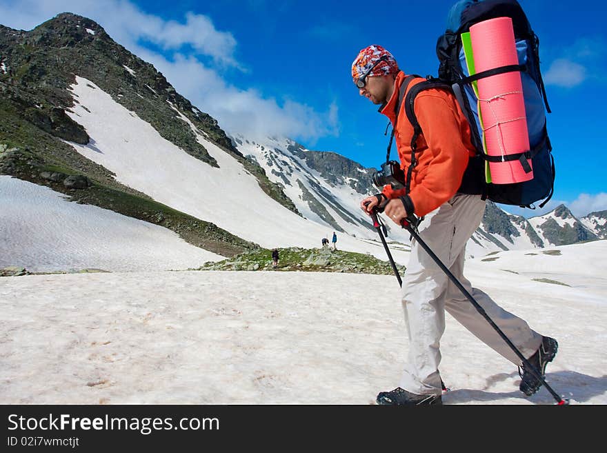 Hiker boy in Caucasus mountains