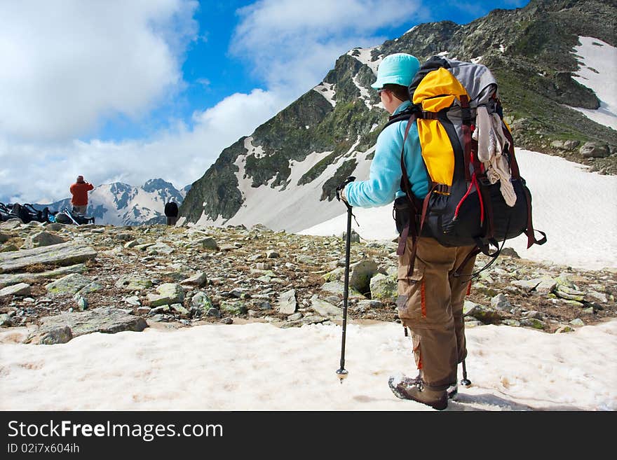 Hiker boy in Caucasus mountains