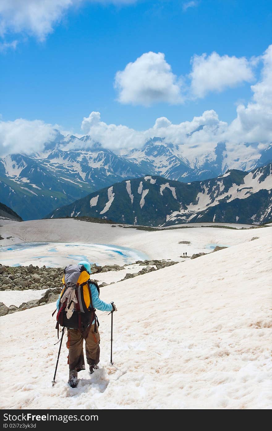 Hiker boy in Caucasus mountains