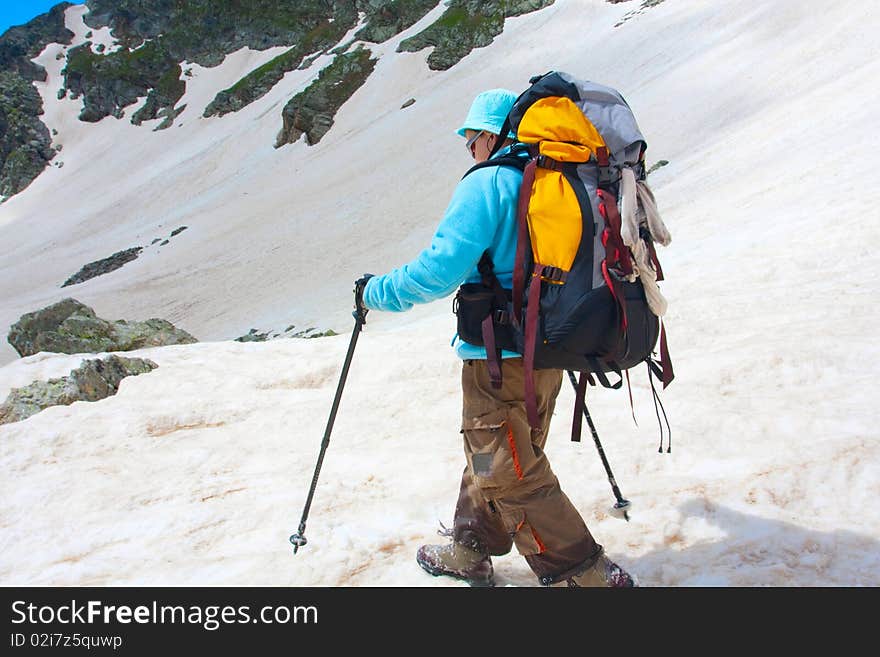 Hiker boy in Caucasus mountains