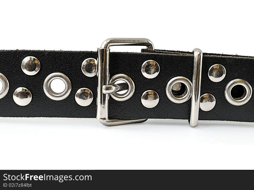 Fragment of a black belt and buckle, isolated on a white background