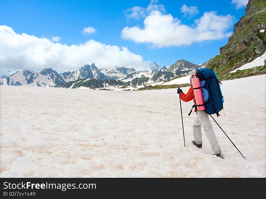 Hiker boy in Caucasus mountains