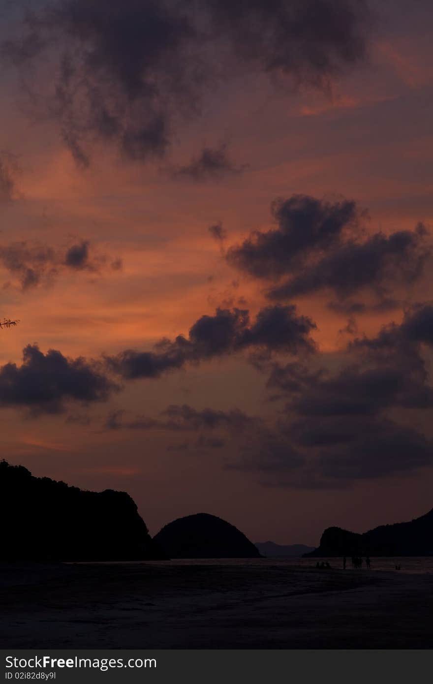 A silhouette of mountain with beautiful sky and sunset at Pranburi, Thailand. A silhouette of mountain with beautiful sky and sunset at Pranburi, Thailand