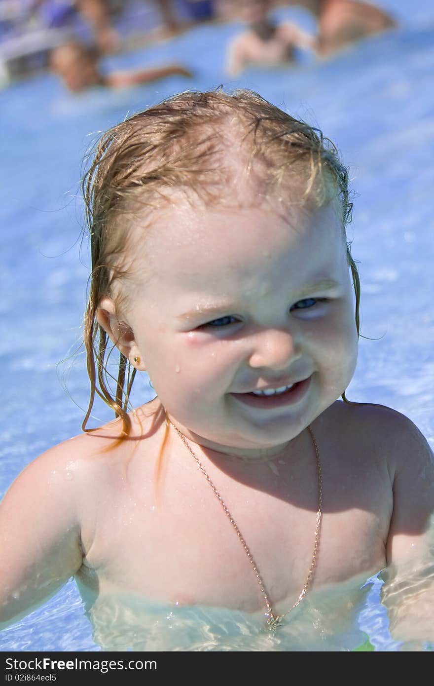 Little girl in a swimming pool