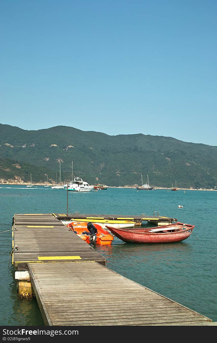 Little Pier With Boats