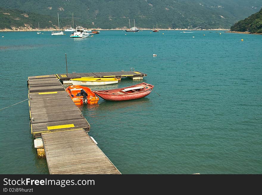 Little Pier With Boats