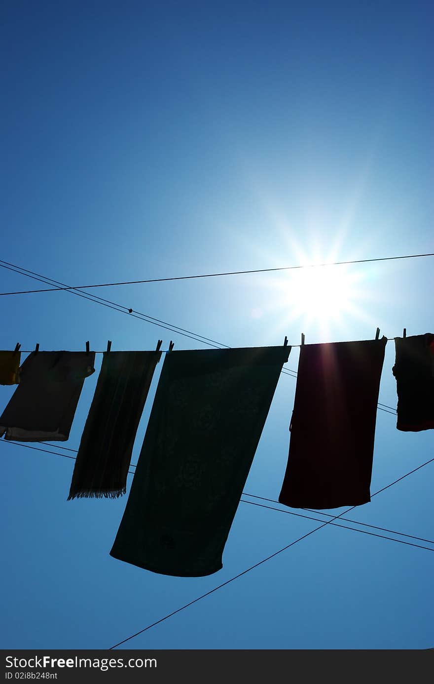 Silhouette of linens on the rope. Conceptual scene. Silhouette of linens on the rope. Conceptual scene.