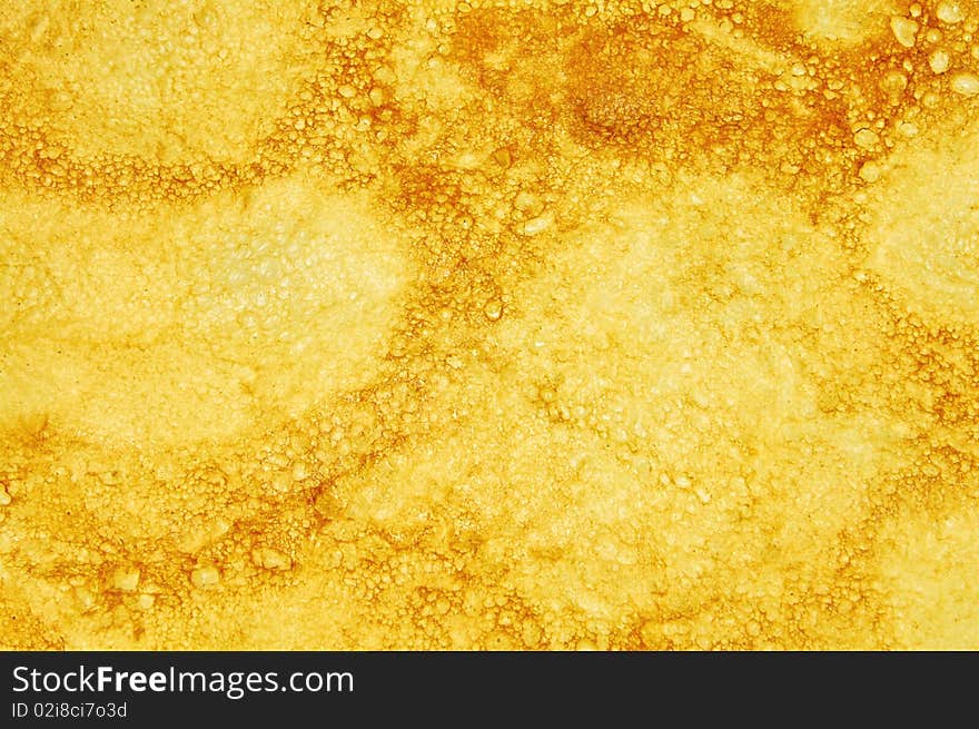 Grunge pancake texture closeup detail. Grunge pancake texture closeup detail