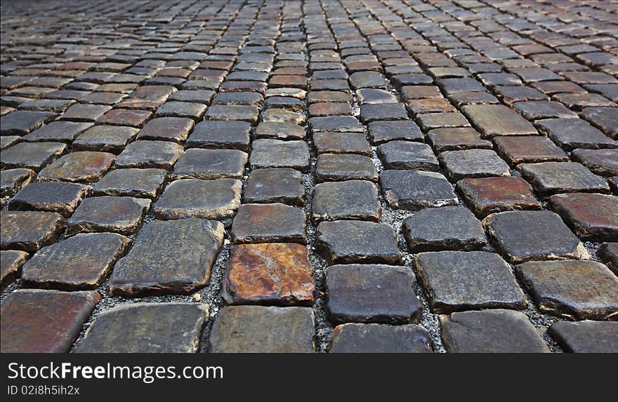 Background with cobblestone road