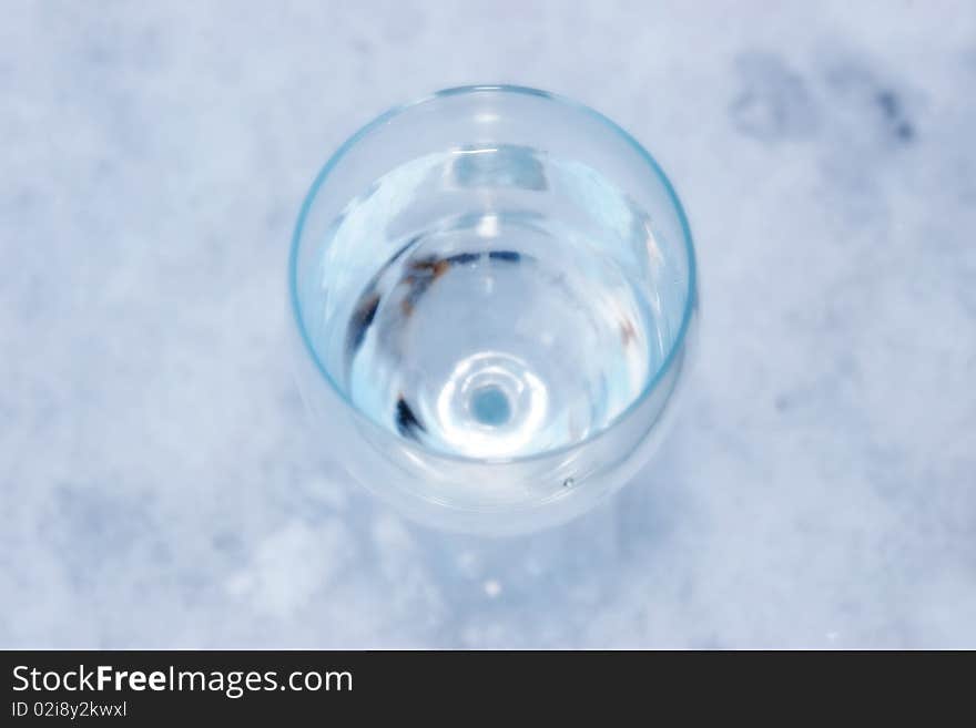 Glass Of Cool Water In Icy Crisp Snow