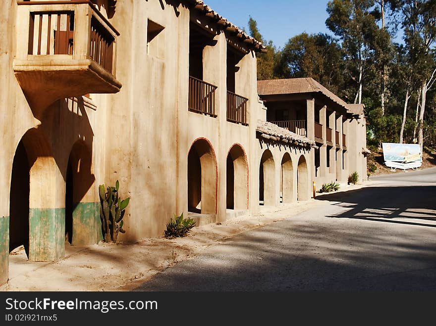 An old mexican villa mlooking street. An old mexican villa mlooking street