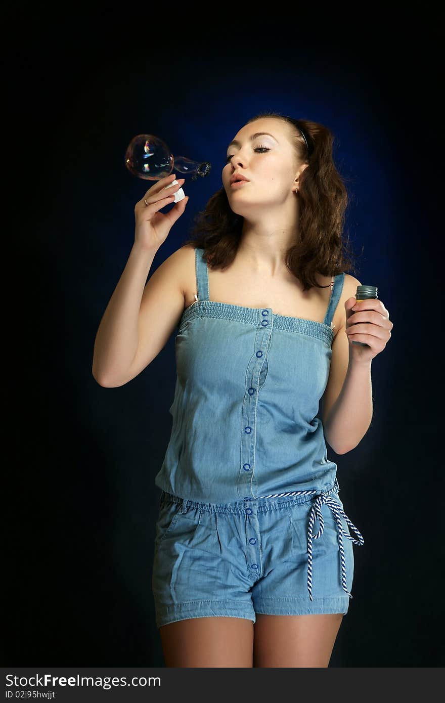 The girl and a soap bubble.