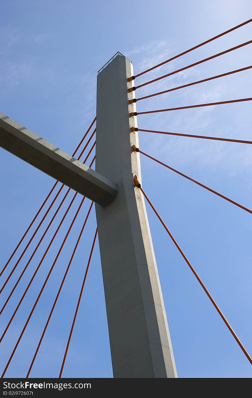 Suspension bridge pillar with lines