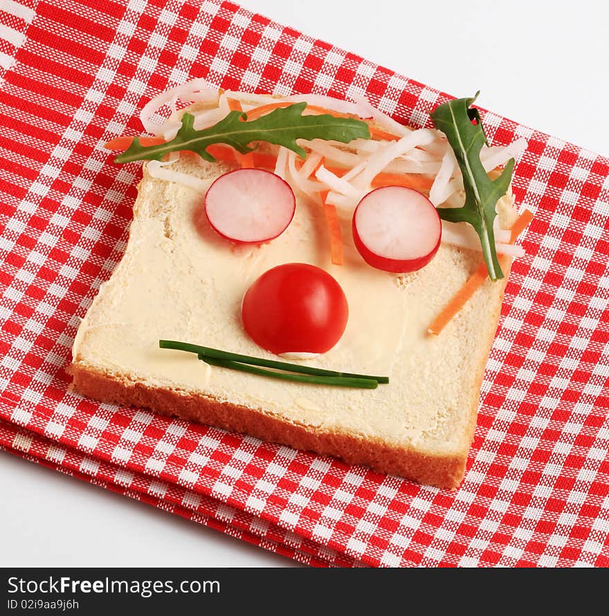 Slice of white bread and fresh vegetables. Slice of white bread and fresh vegetables