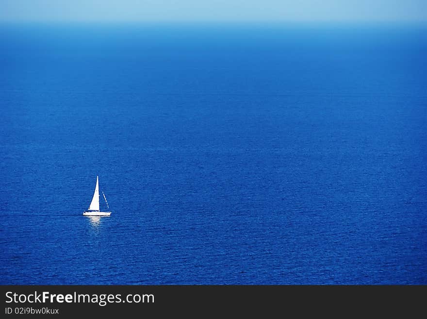 Sailing Boat At An Open Sea