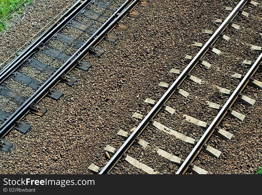 Old wooden and new concrete railroad tracks