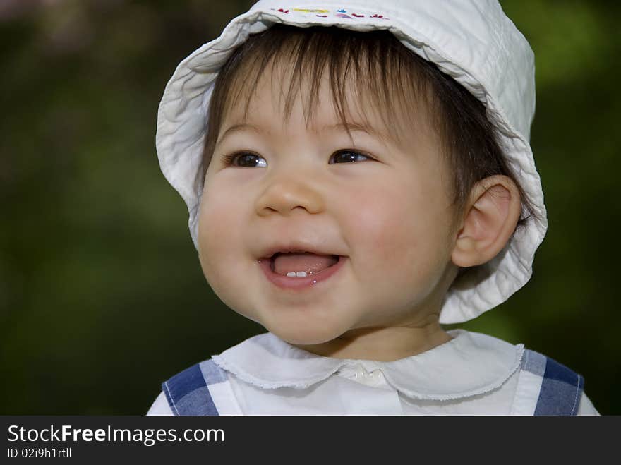 Cute little girl in garden