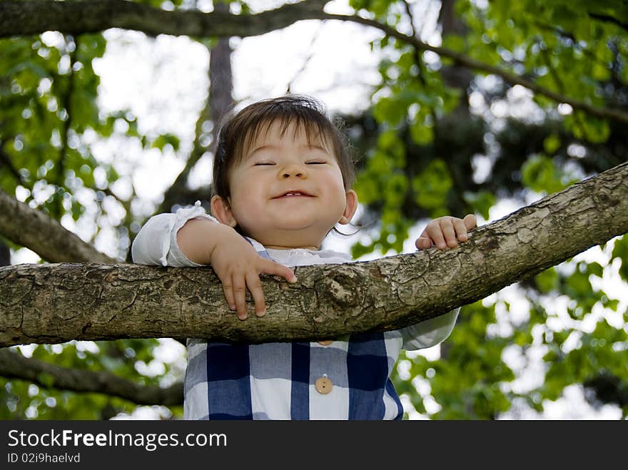 Cute little girl playing in garden