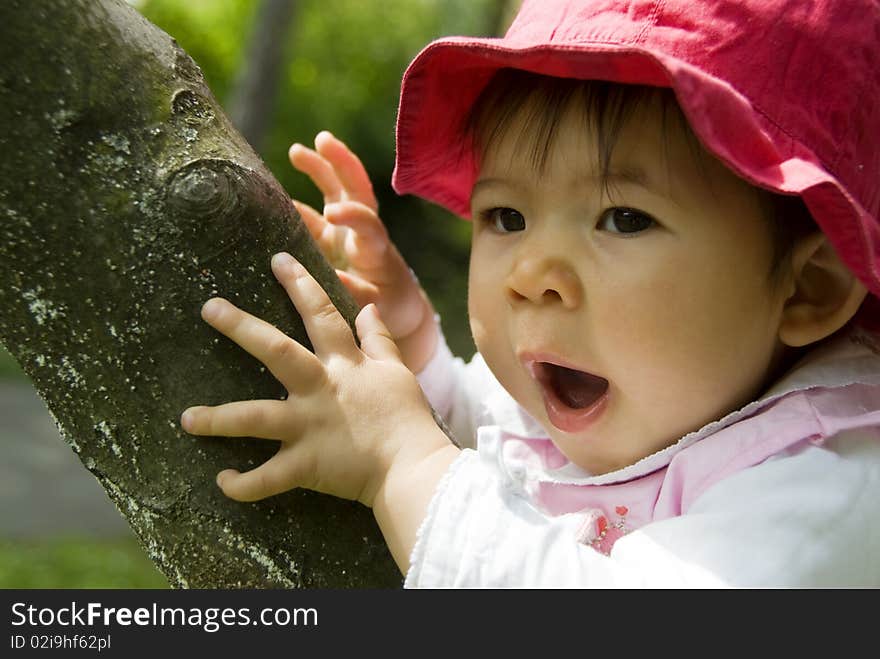 Cute little girl in garden