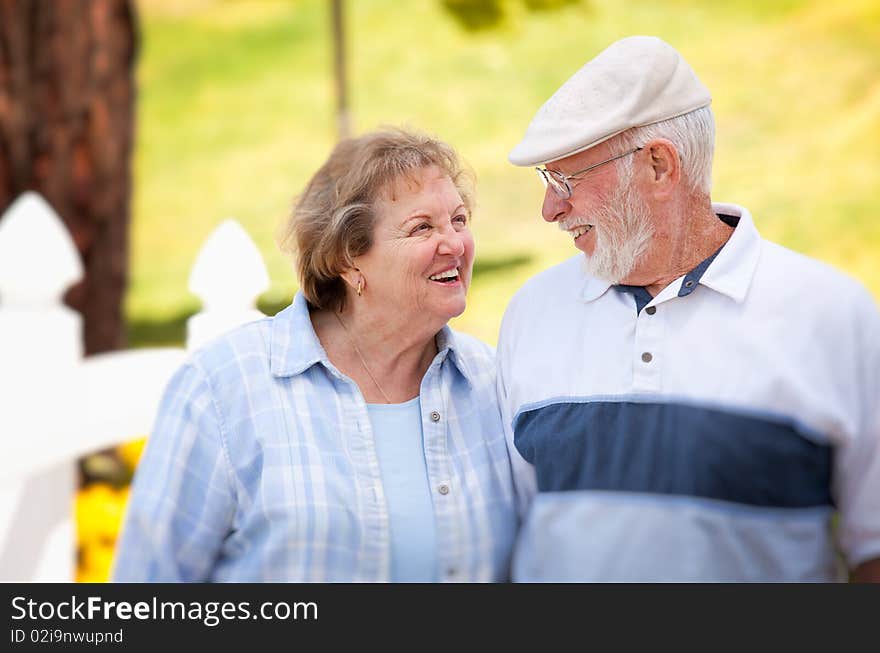 Happy Senior Couple In The Park