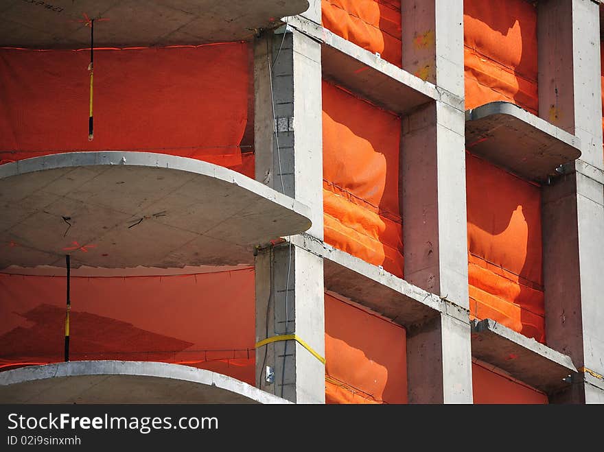 Orange tarp covers the open floors of a newly built building on the Upper West Side of Manhattan. Orange tarp covers the open floors of a newly built building on the Upper West Side of Manhattan.