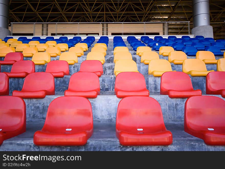 Stadium seats in row with colorful