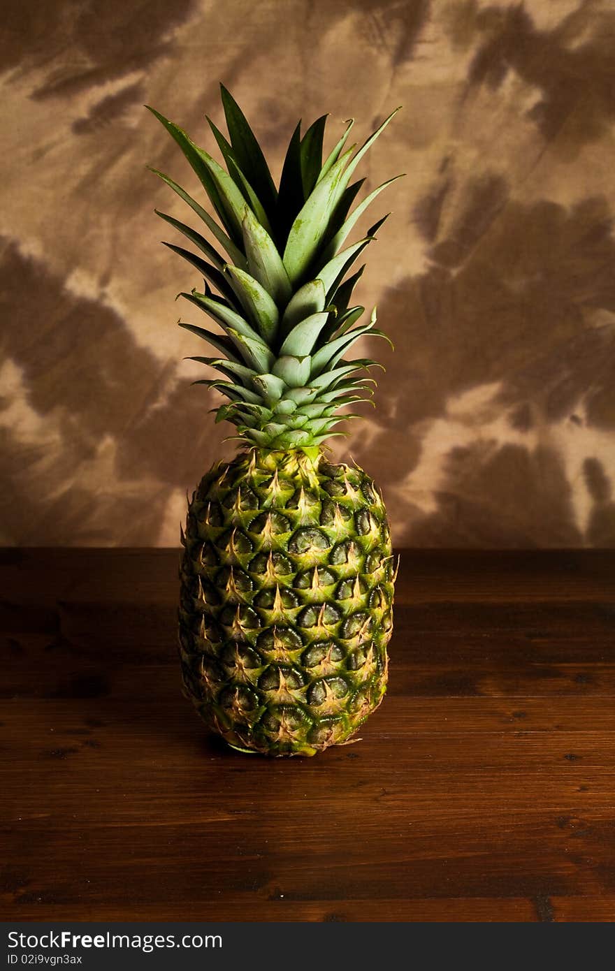 Pineapple On Wood Table