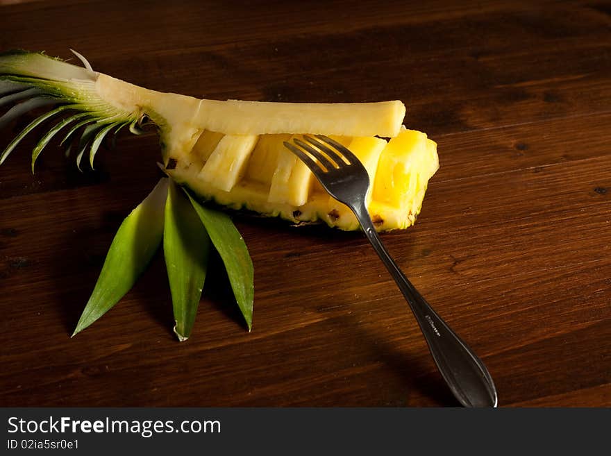 Pineapple On Wood Table