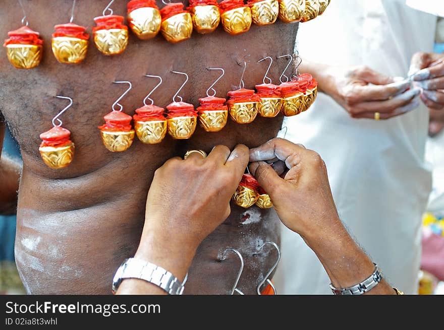 Hanging of bottles on the body. Hanging of bottles on the body