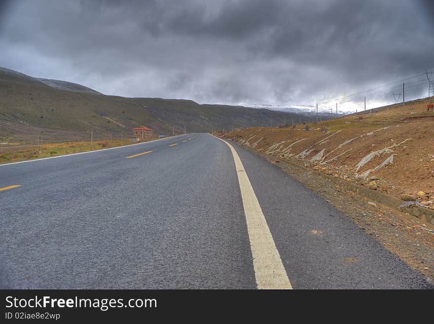 Mountain road sky snow