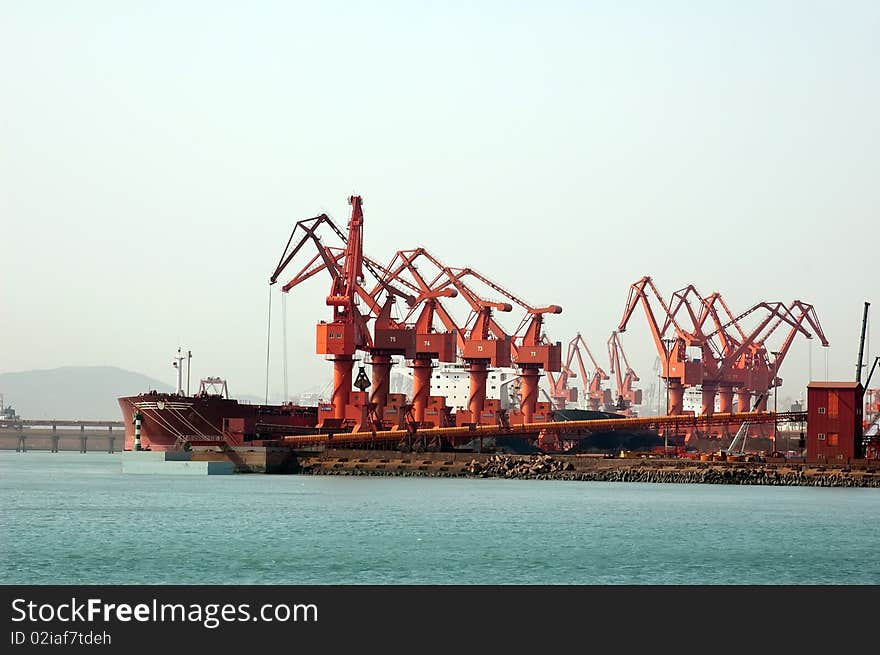 Large Bulk carrier in a dock at Qingdao China. Large Bulk carrier in a dock at Qingdao China