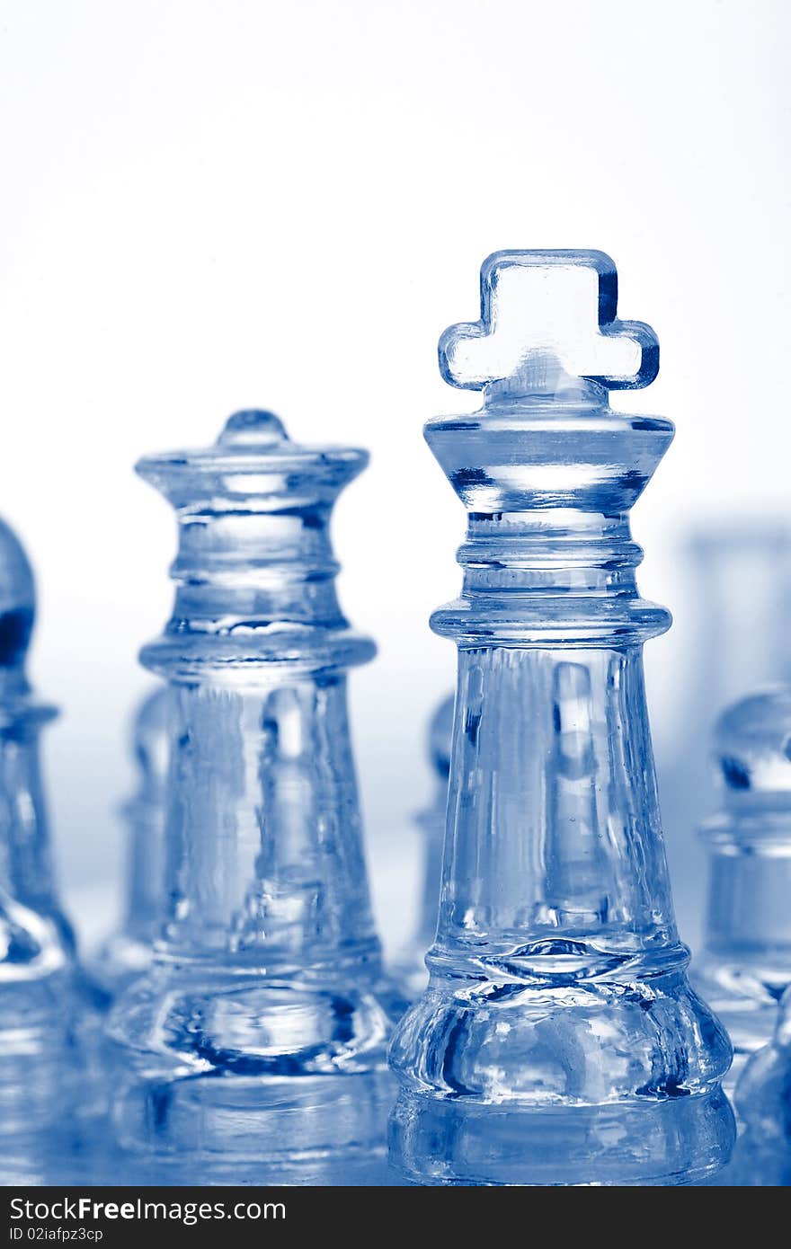 Glass Chess Pieces With Blue Light