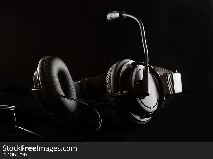 The low-key photo of a stereo headphones. The low-key photo of a stereo headphones