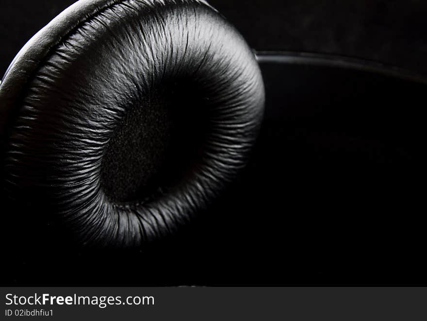 The low-key photo of a stereo headphones. The low-key photo of a stereo headphones