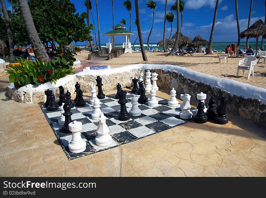 Live size chess on beach in tropical resort, Dominican Republic