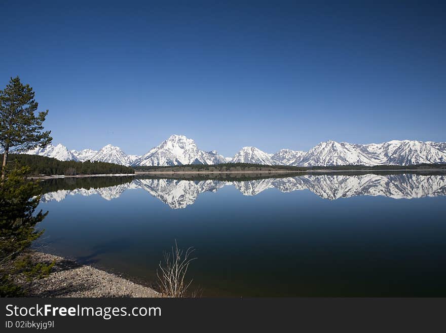 Reflection in the lac of the Grand Tetons in Wyoming