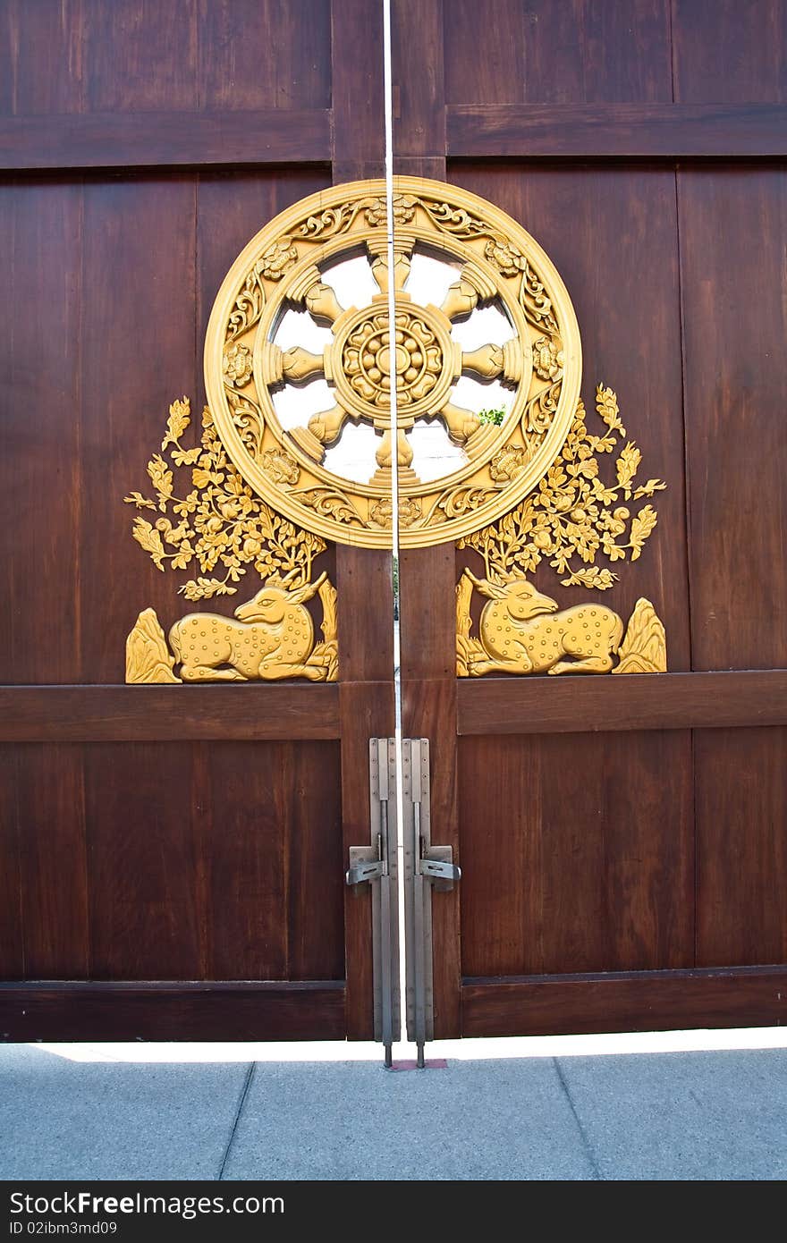 The locked symbol door in baromraja temple thailand